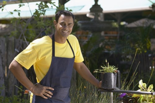 Landscapers Eltham team sorting green waste for eco-friendly disposal
